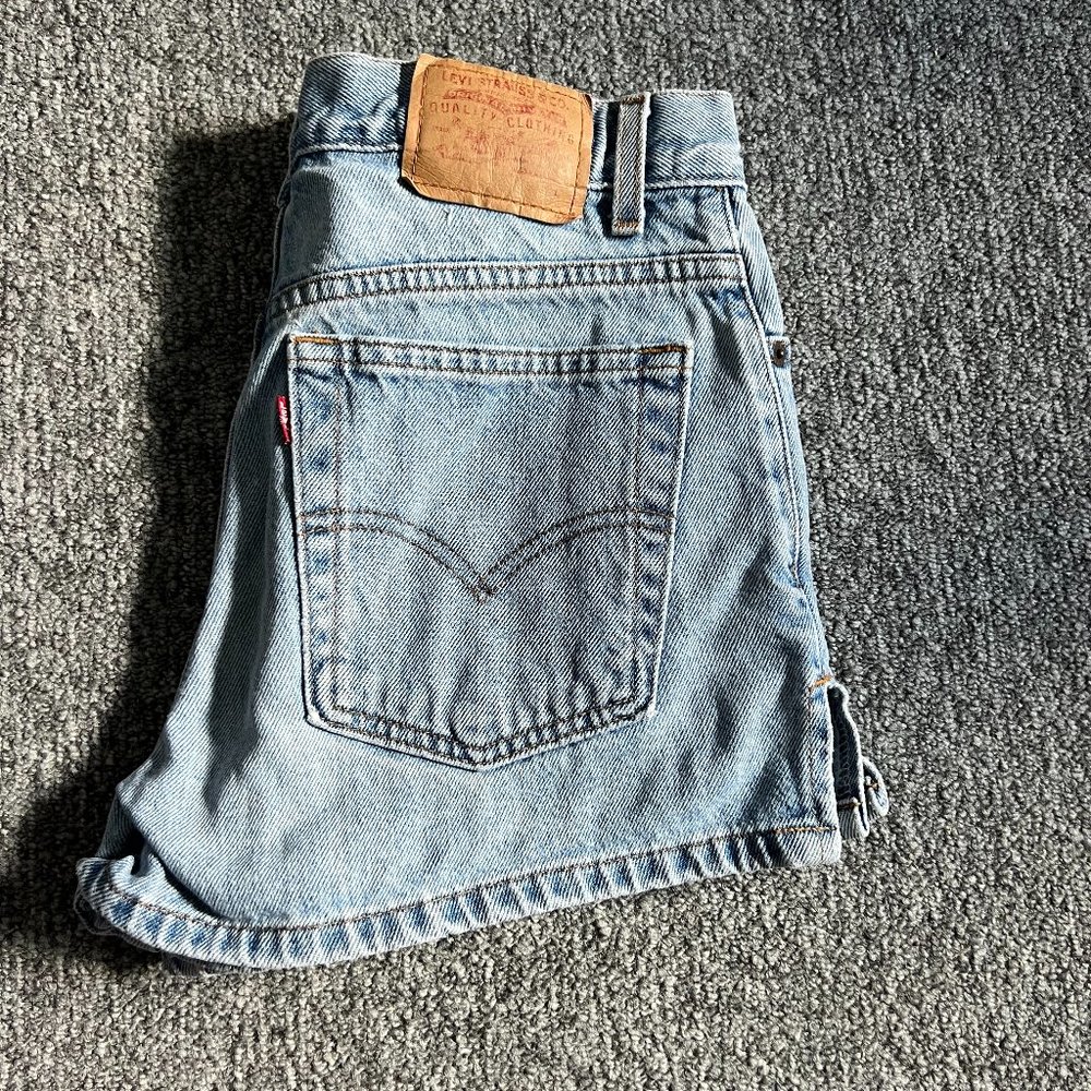 Vintage Levi size small with side slit